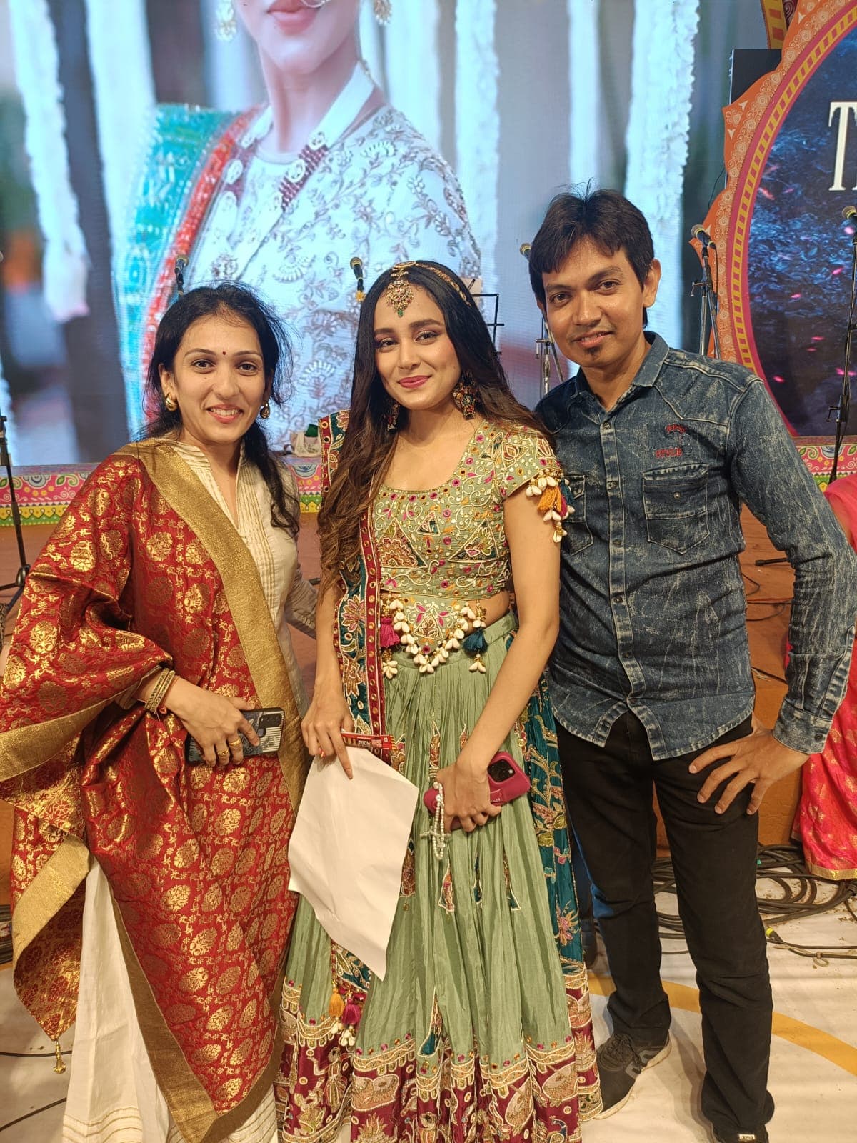 Mrugesh Shukla with guest performers backstage at a live event