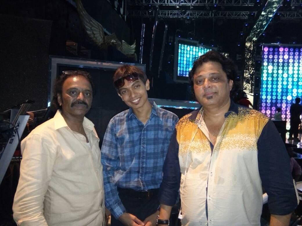 Mrugesh Shukla backstage with fellow musicians at a concert